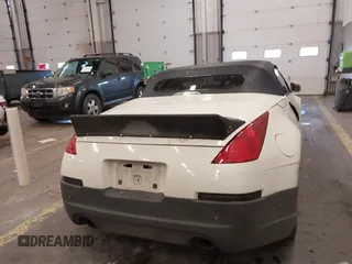 2005 Nissan 350Z Touring with VIN JN1AZ36A45M754923, listed as a IAAI auction lot 41720671 with 124,916 mi miles. Bid and sale history available at carsss.com. Image 16.