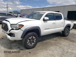 2021 Toyota Tacoma SR with VIN 3TMCZ5AN9MM400216, listed as a Copart auction lot 56690875 with 85,891 mi miles and Non repairable. Bid and sale history available at DreamBid. Image 1.