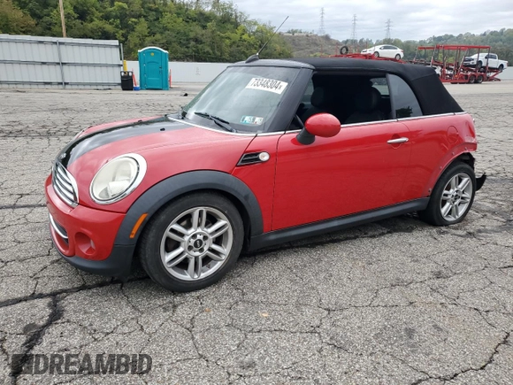 2011 MINI Convertible with VIN WMWZN3C51BTZ78331, listed as a Copart auction lot 73348304 with 94,219 mi miles and Salvage title. Bid and sale history available at DreamBid. Image 1.