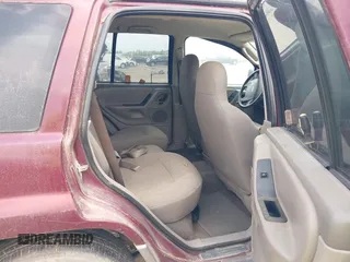 2003 Jeep Grand Cherokee Laredo with VIN 1J4GX48S83C576892, listed as a IAAI auction lot 42082865 with 212,157 mi miles. Bid and sale history available at carsss.com. Image 8.
