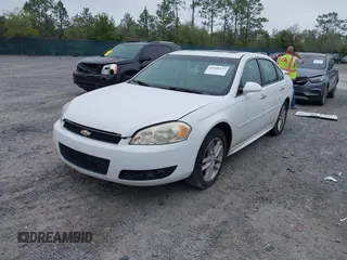2013 Chevrolet Impala LTZ with VIN 2G1WC5E39D1202260, listed as a IAAI auction lot 41908155 with 210,193 mi miles and . Bid and sale history available at DreamBid. Image 17.