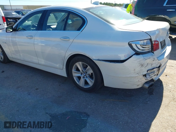 2013 BMW 5 Series 528i with VIN WBAXG5C56DDY31982, listed as a IAAI auction lot 40906428 with 248,336 mi miles and . Bid and sale history available at carsss.com. Image 3.