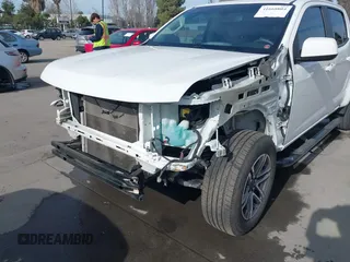 2021 Chevrolet Colorado 2WD Work Truck z VIN 1GCGSBENXM1118310, wystawiony jako IAAI lot #41668804 z przebiegiem 65 295 mil mil oraz . Historia ofert i sprzedaży dostępna na DreamBid. Obrazek 6.