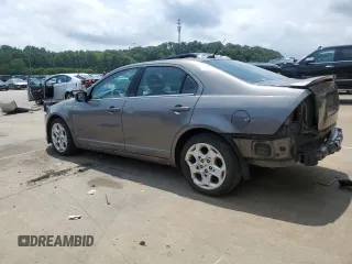 2010 Ford Fusion SE with VIN 3FAHP0HA4AR387638, listed as a Copart auction lot 60649585 with 210,779 mi miles and Salvage title. Bid and sale history available at DreamBid. Image 2.