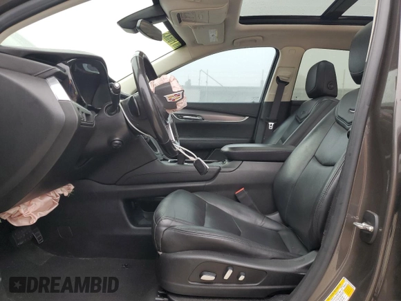 2019 Cadillac XT5 Luxury FWD with VIN 1GYKNCRSXKZ141831, listed as a Copart auction lot 43758765 with 97,402 mi miles and Salvage Title. Bid and sale history available at DreamBid. Image 7.