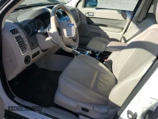 2010 Ford Escape Hybrid with VIN 1FMCU4K38AKB79549, listed as a Copart auction lot 57293035 with 83,742 mi miles and Salvage title. Bid and sale history available at DreamBid. Image 7.