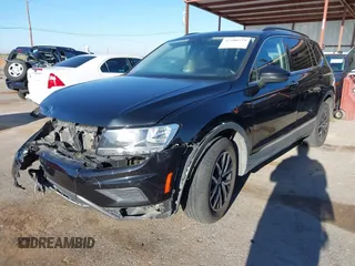 2021 Volkswagen Tiguan SE z VIN 3VV3B7AX0MM080853, wystawiony jako IAAI lot #42406539 z przebiegiem 73 295 mil mil oraz . Historia ofert i sprzedaży dostępna na DreamBid. Obrazek 18.