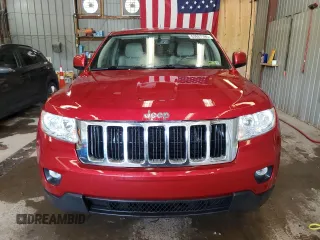2011 Jeep Grand Cherokee Laredo with VIN 1J4RR4GG3BC669561, listed as a Copart auction lot 63627395 with 99,211 mi miles and Salvage title. Bid and sale history available at DreamBid. Image 5.