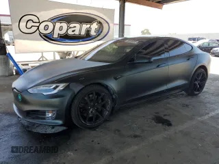 2018 Tesla Model S 75D with VIN 5YJSA1E21JF282786, listed as a Copart auction lot 58058595 with 65,982 mi miles and Salvage title. Bid and sale history available at DreamBid. Image 1.