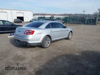 2014 Ford Taurus Limited with VIN 1FAHP2F86EG134779, listed as a IAAI auction lot 41660527 with 115,016 mi miles. Bid and sale history available at carsss.com. Image 4.