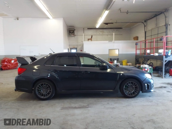 2012 Subaru WRX WRX z VIN JF1GV7E66CG002732, wystawiony jako IAAI lot #41908167 z przebiegiem 160 730 mil mil oraz . Historia ofert i sprzedaży dostępna na DreamBid. Obrazek 14.