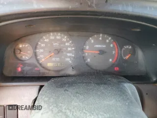 2000 Nissan Frontier XE z VIN 1N6ED27Y2YC369211, wystawiony jako Copart lot #80594884 z przebiegiem 225 194 mil mil oraz Czysty tytuł • Clean title. Historia ofert i sprzedaży dostępna na DreamBid. Obrazek 9.