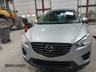 2016 Mazda CX-5 Sport with VIN JM3KE2BY2G0718434, listed as a IAAI auction lot 41961364 with 145,748 mi miles. Bid and sale history available at carsss.com. Image 12.