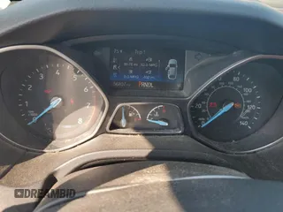 2017 Ford Focus SE with VIN 1FADP3F26HL313478, listed as a Copart auction lot 57078015 with 56,807 mi miles and Salvage title. Bid and sale history available at DreamBid. Image 9.
