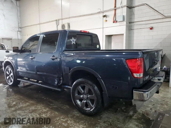 2015 Nissan Titan SL with VIN 1N6AA0EC1FN509625, listed as a Copart auction lot 41700575 with 100,327 mi miles and Salvage Title. Bid and sale history available at carsss.com. Image 2.