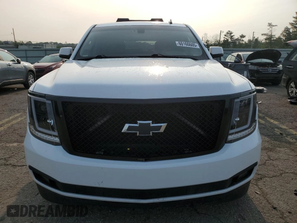 2015 Chevrolet Tahoe Commercial with VIN 1GNLC2EC1FR296841, listed as a Copart auction lot 60160605 with 105,096 mi miles and Salvage title. Bid and sale history available at DreamBid. Image 5.