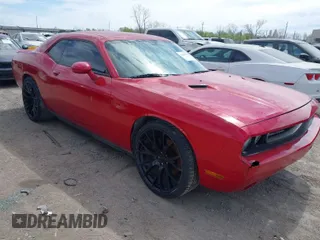 2012 Dodge Challenger SXT Plus with VIN 2C3CDYAG4CH180843, listed as a IAAI auction lot 41810783 with 145,470 mi miles. Bid and sale history available at carsss.com. Image 1.