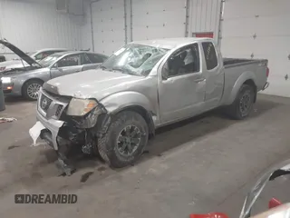 2015 Nissan Frontier SV with VIN 1N6AD0CW4FN751068, listed as a IAAI auction lot 41024078 with 900,000 mi miles and . Bid and sale history available at DreamBid. Image 2.