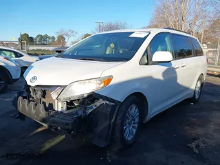 2015 Toyota Sienna XLE with VIN 5TDYK3DC2FS597659, listed as a IAAI auction lot 41380779 with 239,543 mi miles. Bid and sale history available at carsss.com. Image 17.
