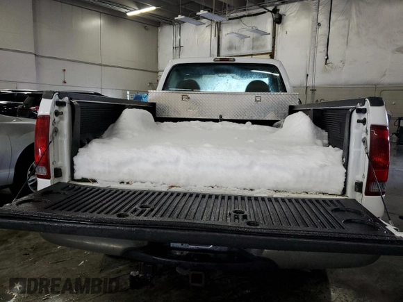 2001 Ford Super Duty F-250 XL with VIN 1FTNF21L21ED24936, listed as a Copart auction lot 79459704 with 69,304 mi miles and Clean Title. Bid and sale history available at carsss.com. Image 6.