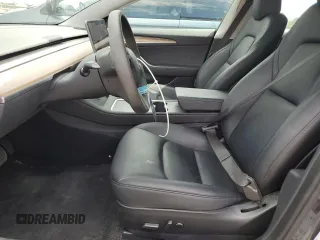 2023 Tesla Model 3 z VIN 5YJ3E1EA1PF692481, wystawiony jako Copart lot #61764165 z przebiegiem 22 649 mil mil oraz Szkoda całkowita • Salvage title. Historia ofert i sprzedaży dostępna na DreamBid. Obrazek 7.