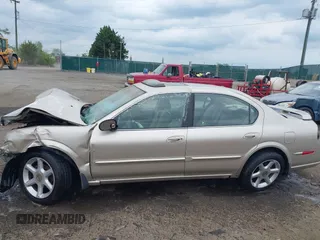 2000 Nissan Maxima GXE z VIN JN1CA31D2YT531324, wystawiony jako IAAI lot #42126970 z przebiegiem 141 864 mil mil oraz . Historia ofert i sprzedaży dostępna na DreamBid. Obrazek 15.