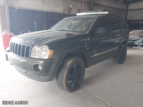 2006 Jeep Grand Cherokee Laredo with VIN 1J8GR48K76C280985, listed as a IAAI auction lot 42015127 with 257,358 mi miles. Bid and sale history available at carsss.com. Image 2.