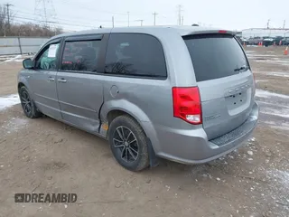 2014 Dodge Grand Caravan SXT with VIN 2C4RDGCGXER308657, listed as a IAAI auction lot 41602422 with 200,643 mi miles and . Bid and sale history available at DreamBid. Image 3.