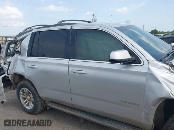 2016 Chevrolet Tahoe LS with VIN 1GNSCAEC2GR392937, listed as a IAAI auction lot 42648714 with 166,764 mi miles and . Bid and sale history available at DreamBid. Image 12.