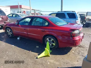 2003 Pontiac Bonneville SLE z VIN 1G2HY52K534159881, wystawiony jako IAAI lot #41604988 z przebiegiem 227 097 mil mil oraz . Historia ofert i sprzedaży dostępna na DreamBid. Obrazek 3.