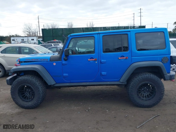 2016 Jeep Wrangler Unlimited Rubicon with VIN 1C4BJWFG2GL192074, listed as a IAAI auction lot 41598861 with 70,000 mi miles. Bid and sale history available at carsss.com. Image 14.