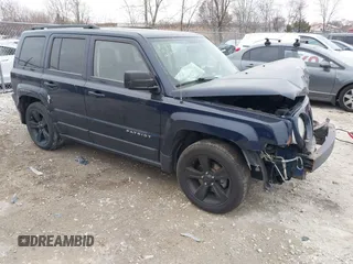 2014 Jeep Patriot Latitude with VIN 1C4NJPFA4ED681811, listed as a IAAI auction lot 41069070 with 143,467 mi miles and . Bid and sale history available at carsss.com. Image 1.