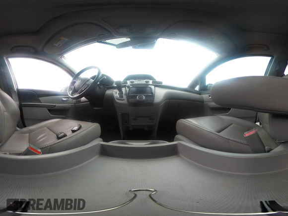 2014 Honda Odyssey Touring with VIN 5FNRL5H91EB081811, listed as a IAAI auction lot 42153920 with 16 mi miles and . Bid and sale history available at DreamBid. Image 18.