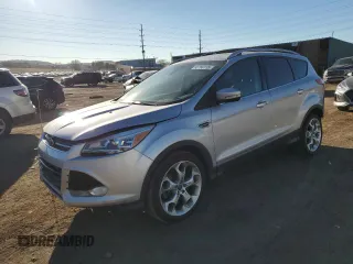 2014 Ford Escape Titanium with VIN 1FMCU9J9XEUB10861, listed as a Copart auction lot 50766115 with 134,469 mi miles and Salvage Title. Bid and sale history available at DreamBid. Image 1.