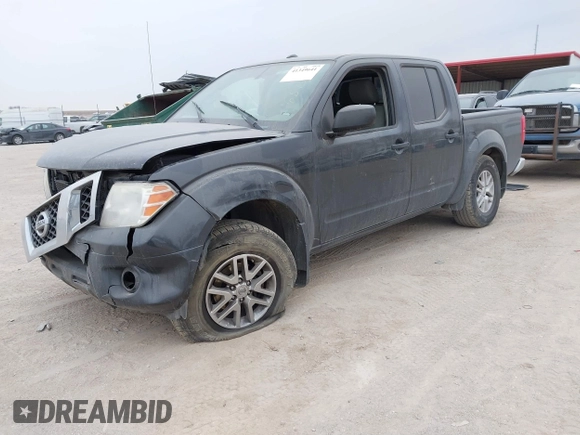 2014 Nissan Frontier SV with VIN 1N6AD0EV9EN726119, listed as a IAAI auction lot 41349641 with 139,652 mi miles and . Bid and sale history available at DreamBid. Image 2.