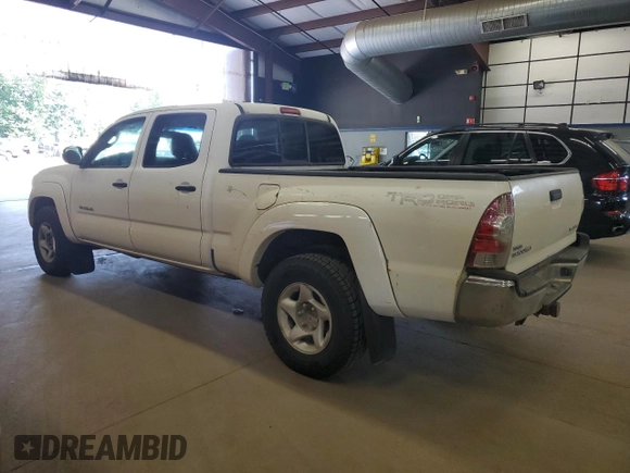 2011 Toyota Tacoma with VIN 3TMMU4FN8BM026877, listed as a Copart auction lot 65326895 with 214,919 mi miles and Clean title. Bid and sale history available at DreamBid. Image 2.