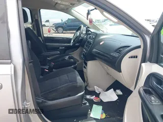 2015 Dodge Grand Caravan American Value with VIN 2C4RDGBGXFR542672, listed as a IAAI auction lot 42230608 with 102,753 mi miles and . Bid and sale history available at DreamBid. Image 5.