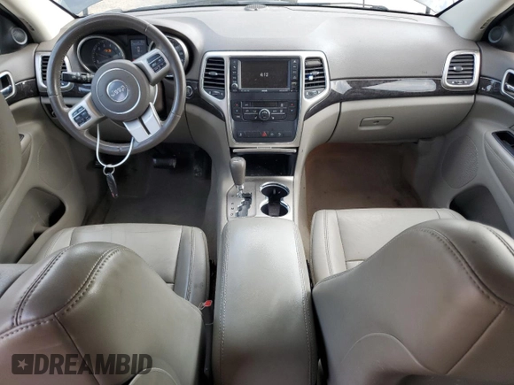 2011 Jeep Grand Cherokee Laredo with VIN 1J4RR4GG1BC610654, listed as a Copart auction lot 58828015 with 155,959 mi miles and Salvage title. Bid and sale history available at DreamBid. Image 8.
