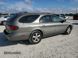 2003 Ford Taurus SE Standard with VIN 1FAFP58U33A259080, listed as a Copart auction lot 86819024 with 143,482 mi miles and Salvage Title. Bid and sale history available at carsss.com. Image 3.