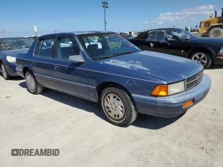 1993 Dodge Spirit z VIN 1B3XA46K0PF638477, wystawiony jako Copart lot #75710534 z przebiegiem 50 637 mil mil oraz Szkody całkowita. Historia ofert i sprzedaży dostępna na DreamBid. Obrazek 4.