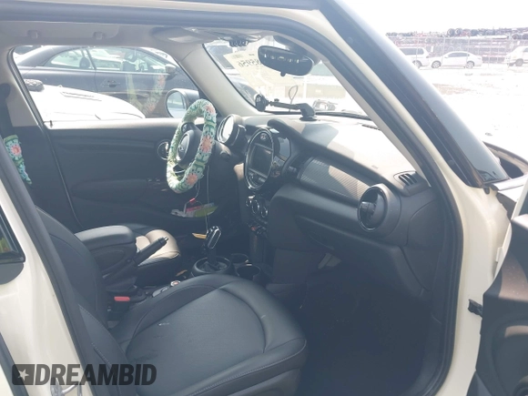 2020 MINI Hardtop 4 Door Cooper with VIN WMWXU7C01L2M54710, listed as a IAAI auction lot 42385956 with 55,714 mi miles and . Bid and sale history available at DreamBid. Image 5.