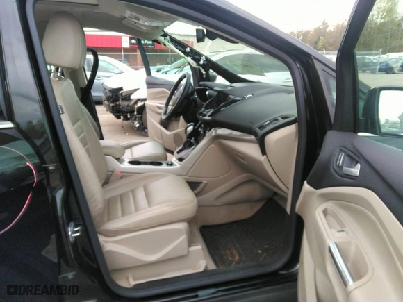 2015 Ford C-Max Energi SEL with VIN 1FADP5CU6FL110038, listed as a IAAI auction lot 41953446 with 56,097 mi miles. Bid and sale history available at carsss.com. Image 5.