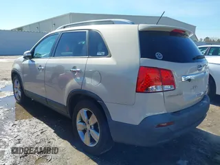 2012 Kia Sorento EX with VIN 5XYKU4A23CG205699, listed as a IAAI auction lot 41384287 with 205,303 mi miles. Bid and sale history available at carsss.com. Image 3.
