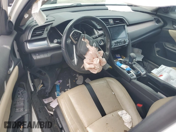2016 Honda Civic EX-L с VIN 2HGFC1F74GH650713, выставлен на аукционе Copart как лот 58959515 с пробегом Не указан миль и Списание • Salvage title. История ставок и продаж доступна на DreamBid. Изображение 8.