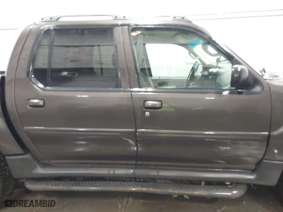 2005 Ford Explorer Sport Trac XLS with VIN 1FMZU77K25UB67905, listed as a IAAI auction lot 41808499 with 140,553 mi miles. Bid and sale history available at carsss.com. Image 13.