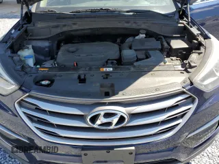 2017 Hyundai Santa Fe 2.4L z VIN 5XYZT3LB2HG496566, wystawiony jako Copart lot #57759925 z przebiegiem 129 094 mil mil oraz Szkoda całkowita • Salvage title. Historia ofert i sprzedaży dostępna na DreamBid. Obrazek 12.