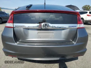 2012 Honda Insight EX z VIN JHMZE2H77CS002907, wystawiony jako Copart lot #52040465 z przebiegiem 158 266 mil mil oraz Szkoda całkowita • Salvage title. Historia ofert i sprzedaży dostępna na DreamBid. Obrazek 6.