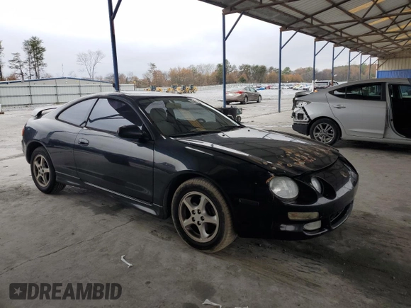 1999 Toyota Celica GT with VIN JT2DG02T5X0057530, listed as a Copart auction lot 43446095 with 347,463 mi miles and Salvage Title. Bid and sale history available at carsss.com. Image 4.