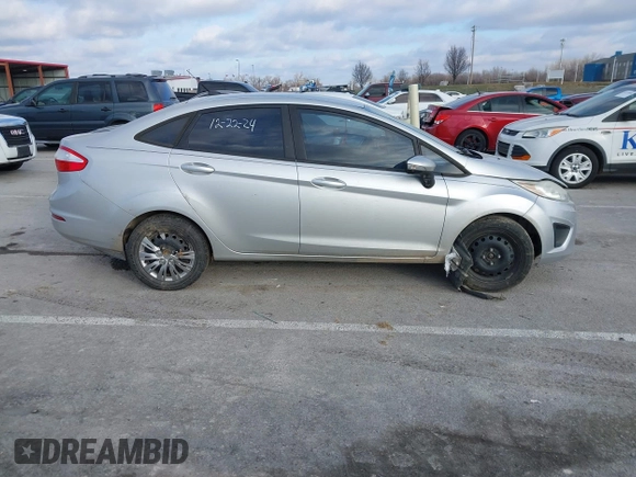 2015 Ford Fiesta SE z VIN 3FADP4BJ1FM220222, wystawiony jako IAAI lot #41209318 z przebiegiem 113 134 mil mil oraz . Historia ofert i sprzedaży dostępna na DreamBid. Obrazek 13.