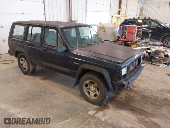 1996 Jeep Cherokee SE z VIN 1J4FJ28S8TL200825, wystawiony jako IAAI lot #42513038 z przebiegiem 226 914 mil mil oraz . Historia ofert i sprzedaży dostępna na DreamBid. Obrazek 1.